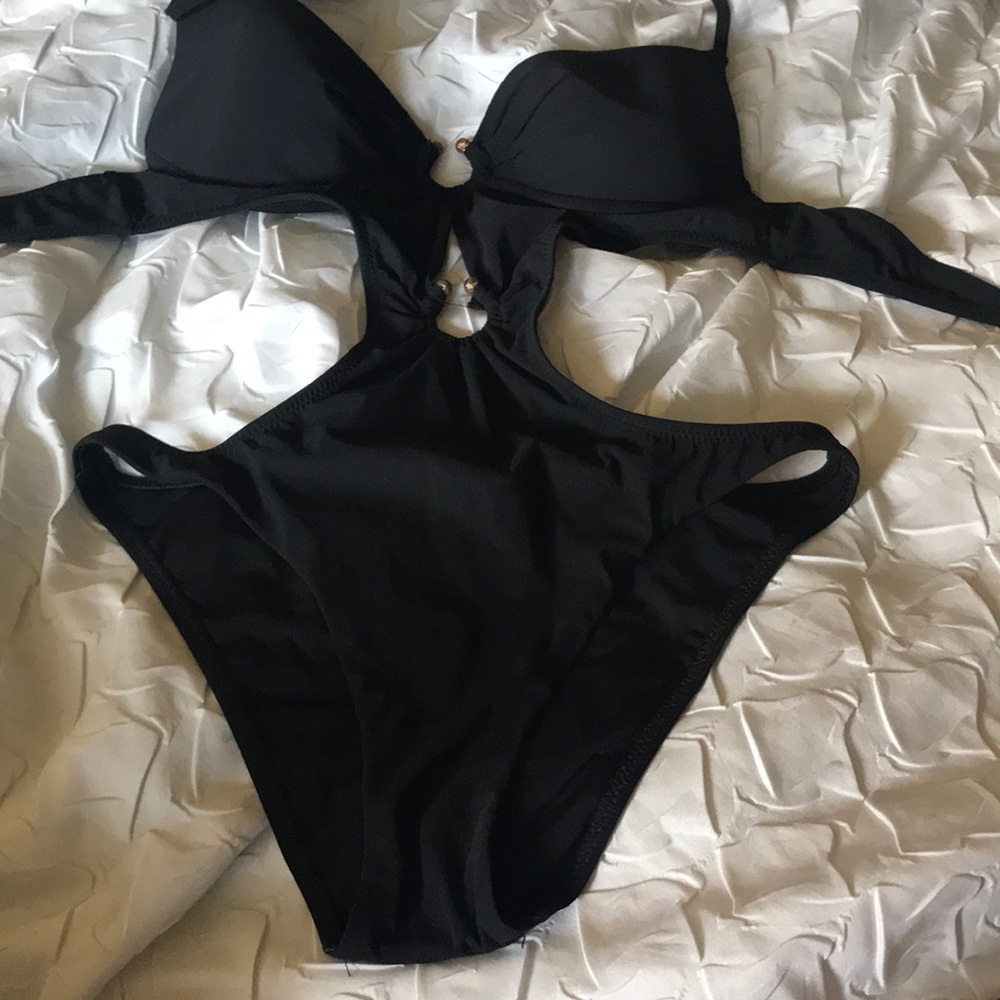 Stylish one piece bathing suit.